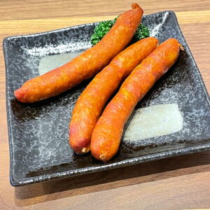 めっちゃ辛いウインナー。富山県砺波市の定食・居酒屋サンタス食堂のフードメニュー。